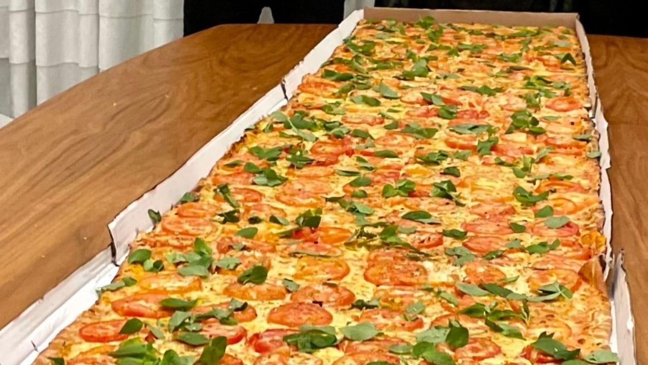 pizza gigante Balneário Camboriú,aniversário 61 anos BC,maior pizza do Brasil,evento gratuito SC,turismo e gastronomia SC,pizza 61 metros